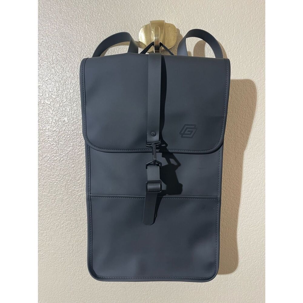 Rains Matte Black Urban Rolltop Backpack
